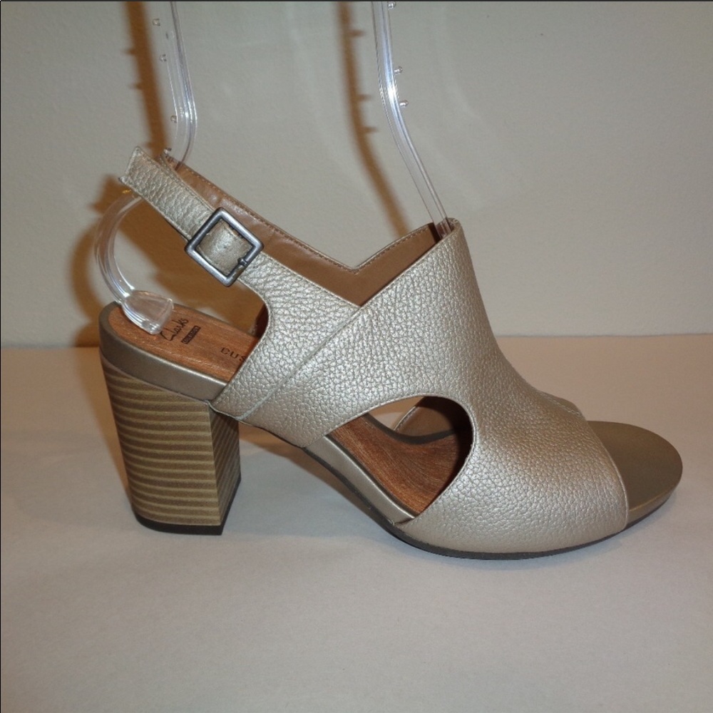Clark’s metallic gold sandals